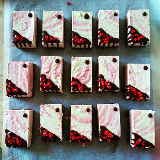rows of rectangular cakes on a counter