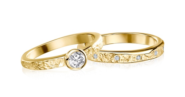 two diamond rings set in yellow gold by Sheila Fleet