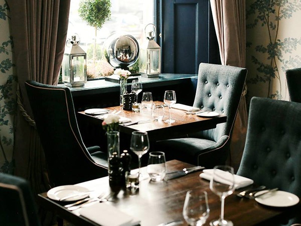 a fine dining at Blackwoods restaurant interior with tables and chairs