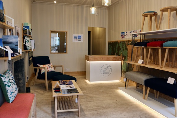 wooden furniture in a shop with a wooden floor and fireplace