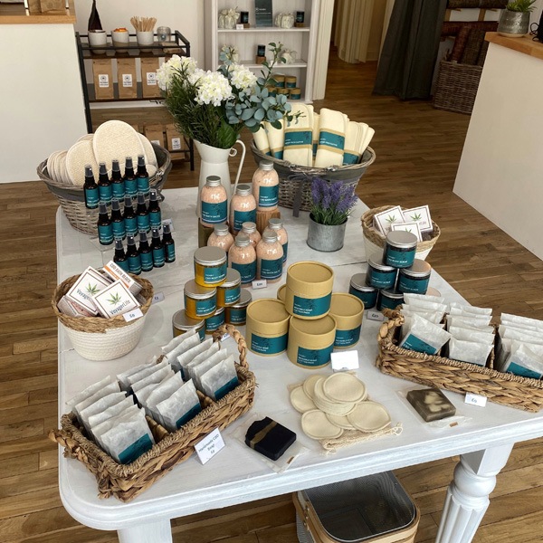 cbd products displayed on a table in a shop