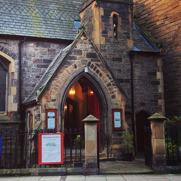 entrance to an old stone chapel