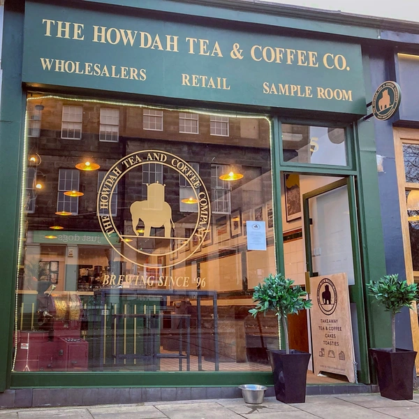 The dark green exterior of the Howdah Tea and Coffee Company on Deanhaugh Street in Stockbridge, Edinburgh