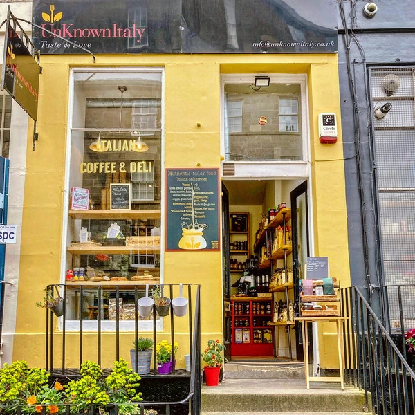 the mustard exterior of an Italian Deli in Stockbridge Edinburgh called UnknownItaly